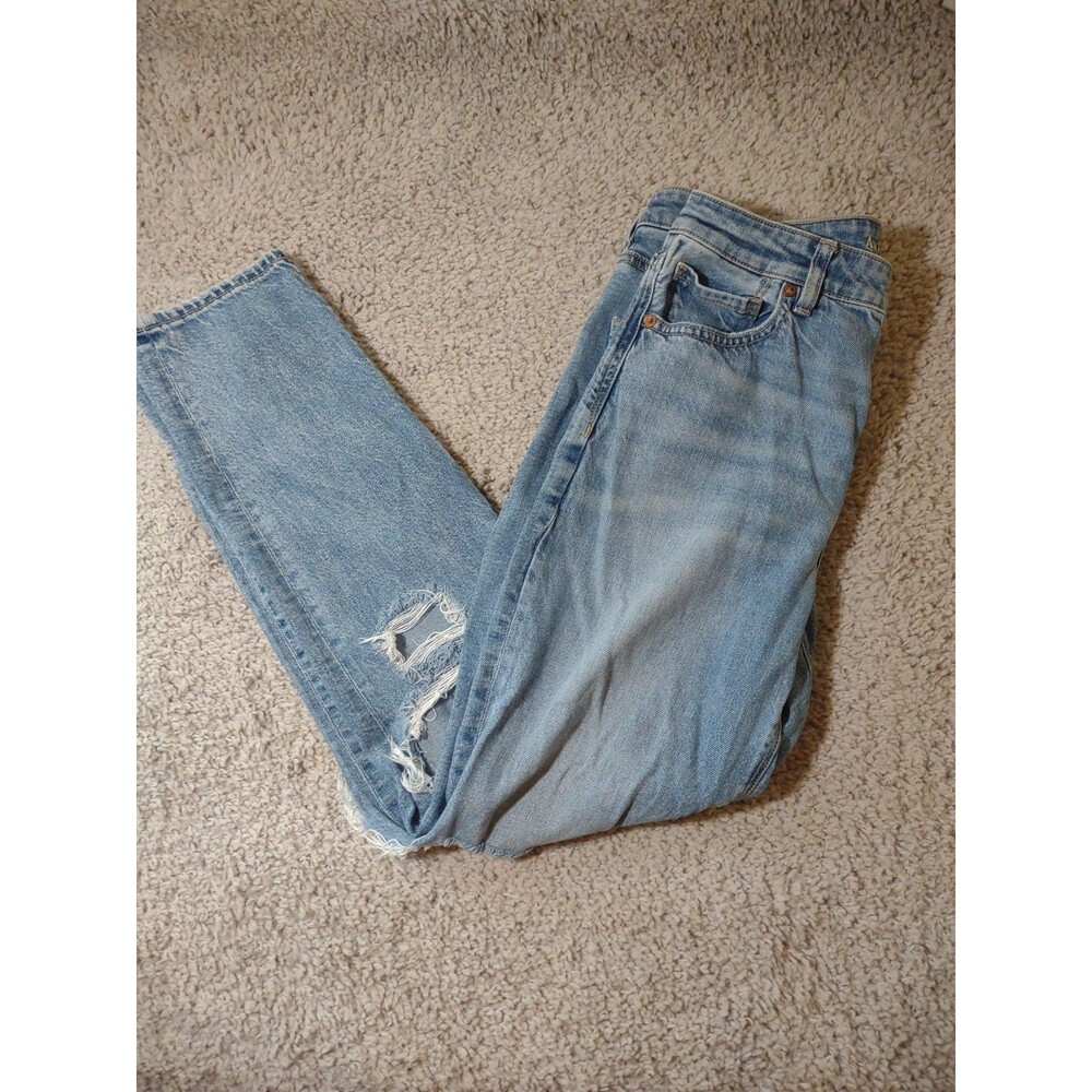 Woman’s Size 8 American Eagle Strigid Blue Jeans Large Distress Holes